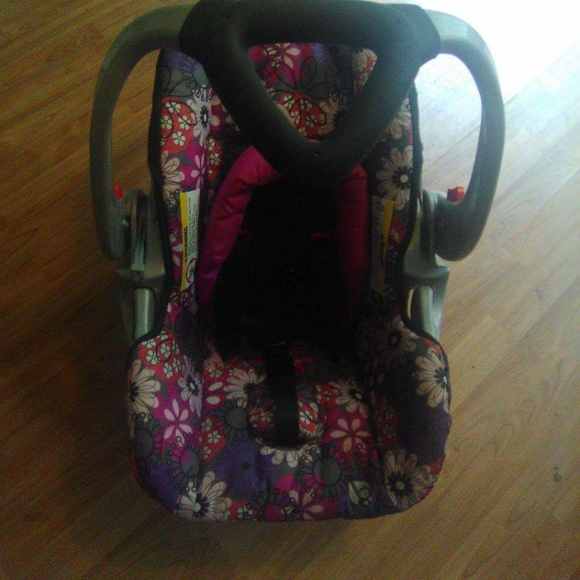 purple car seat and stroller combo